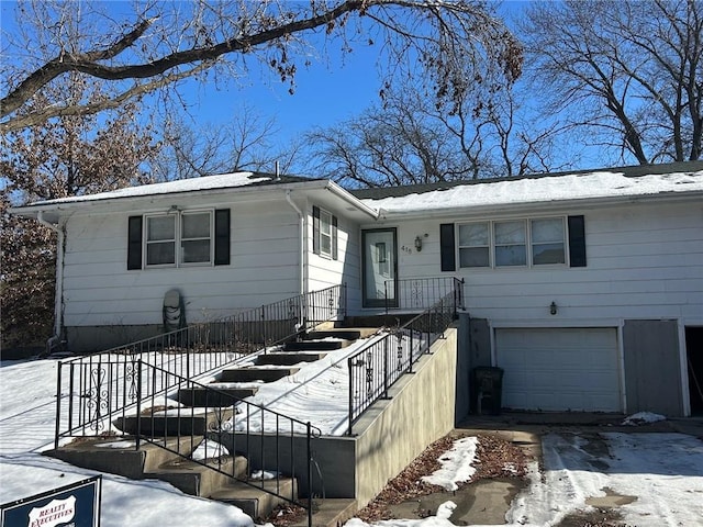 view of front of property with a garage