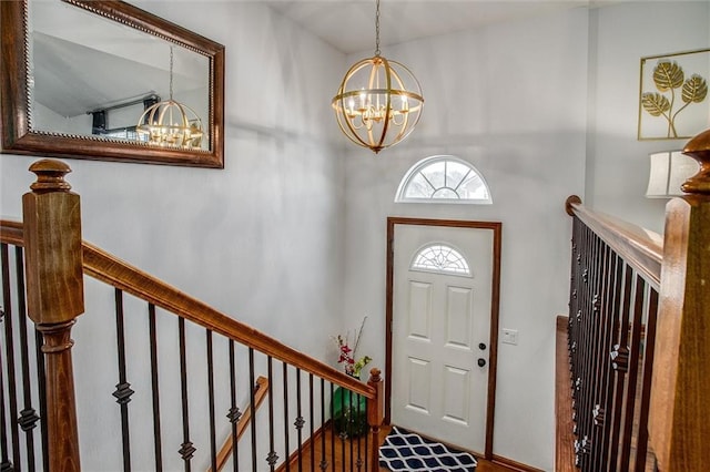 entrance foyer with a notable chandelier