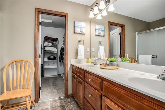 bathroom featuring vanity and walk in shower