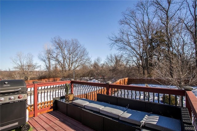 wooden terrace featuring grilling area