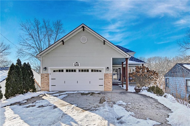 view of front of property with a garage