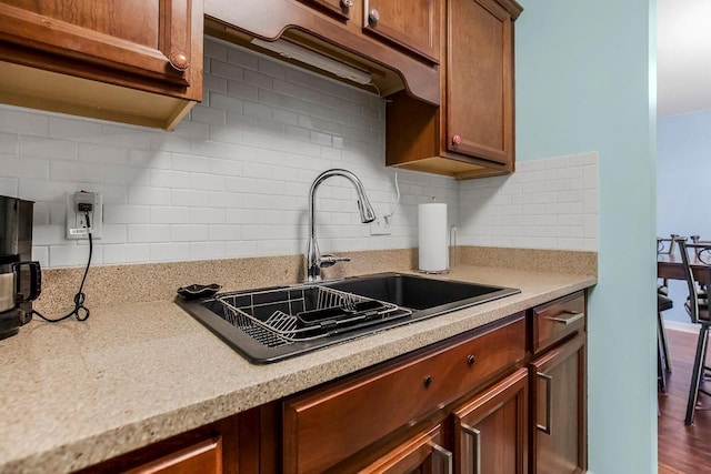 kitchen with sink and backsplash