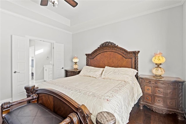 bedroom with ensuite bathroom, ceiling fan, dark hardwood / wood-style flooring, and crown molding