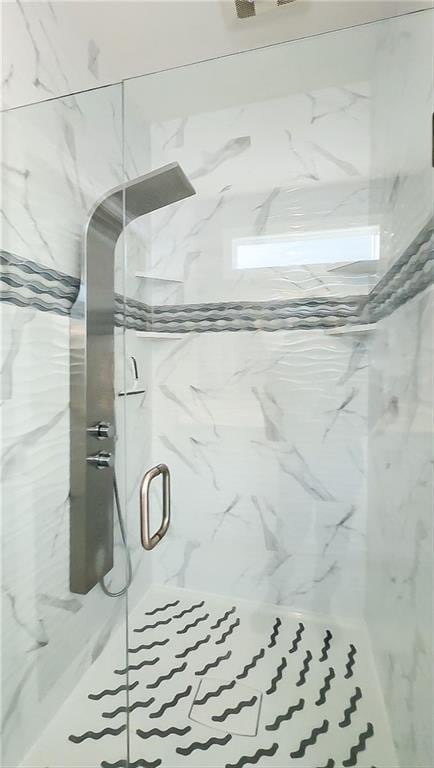 bathroom featuring walk in shower