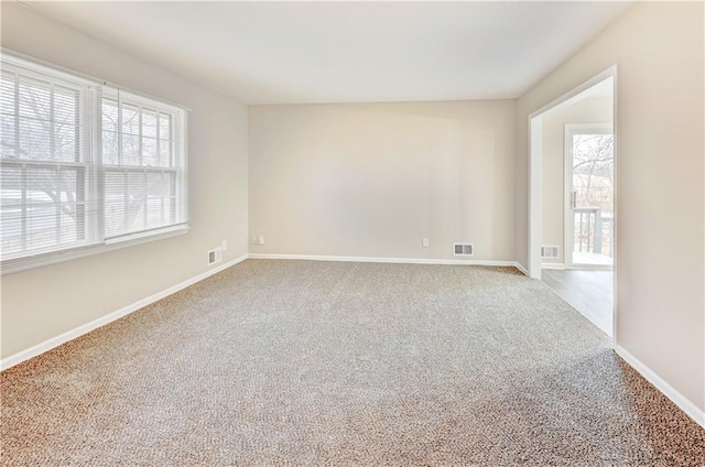 view of carpeted spare room