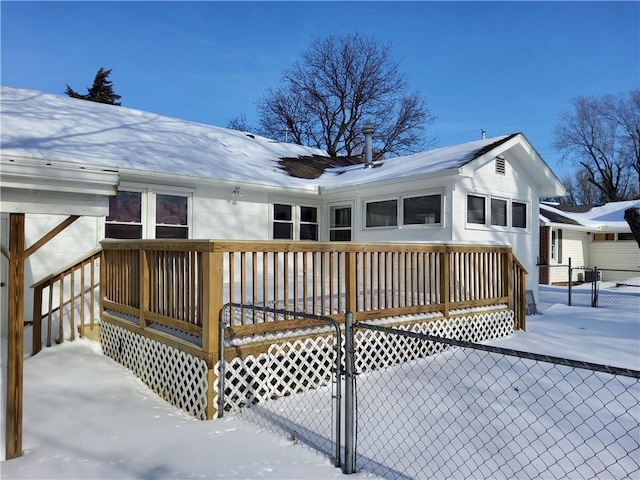 view of snow covered deck