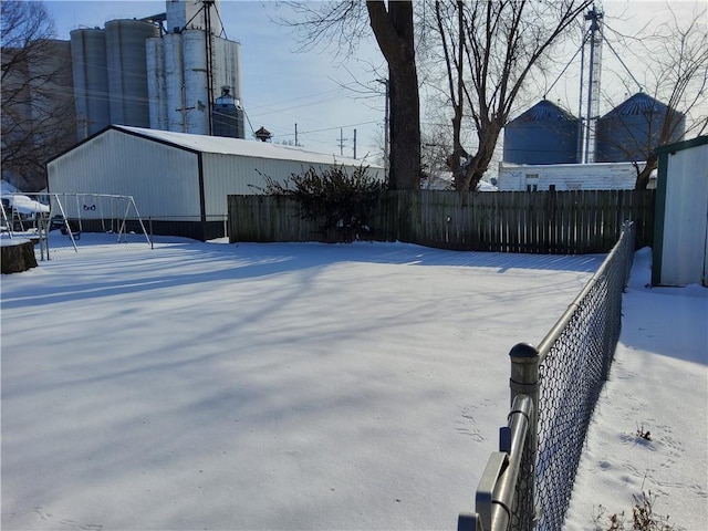 view of yard covered in snow