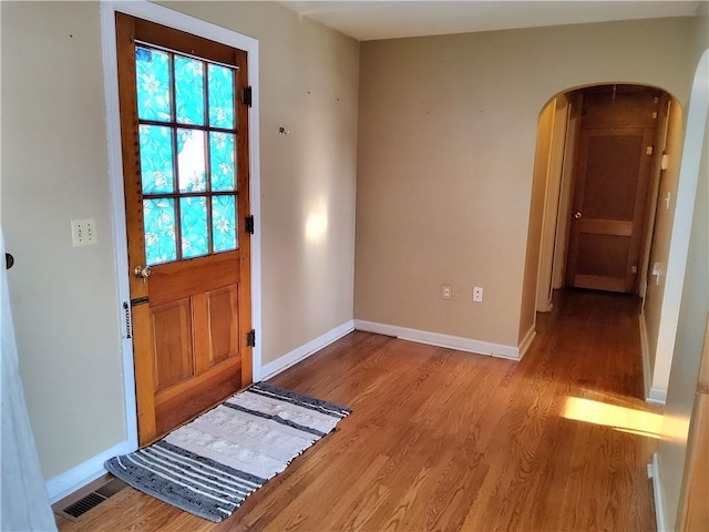 doorway with light hardwood / wood-style floors