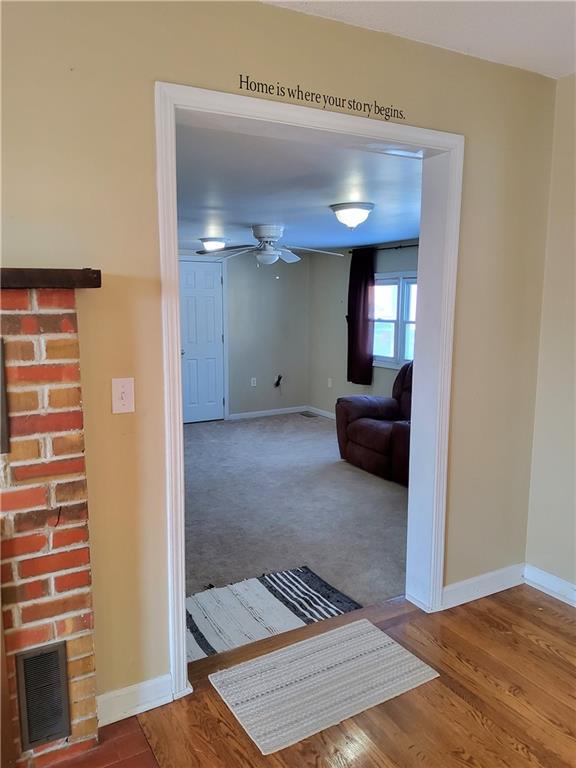 hall featuring hardwood / wood-style flooring