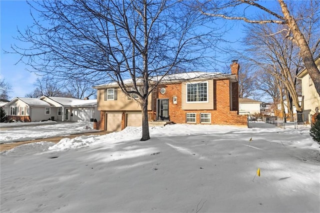 bi-level home featuring a garage