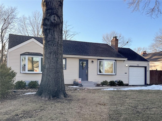 single story home with a garage