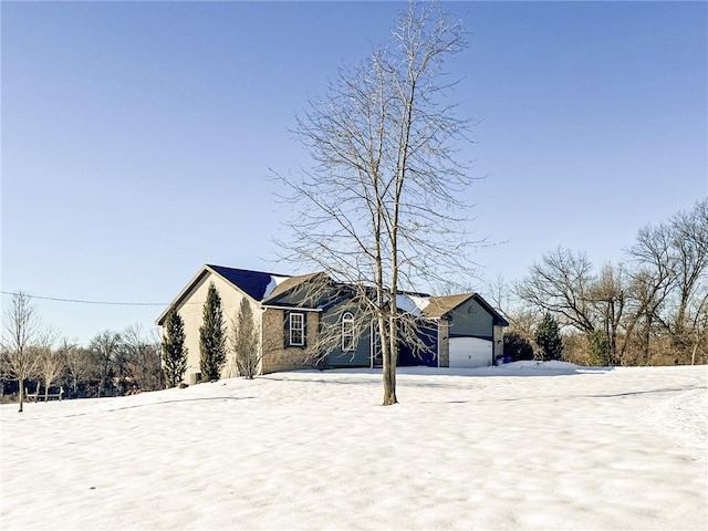 single story home with a garage