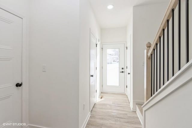 hallway featuring light hardwood / wood-style floors