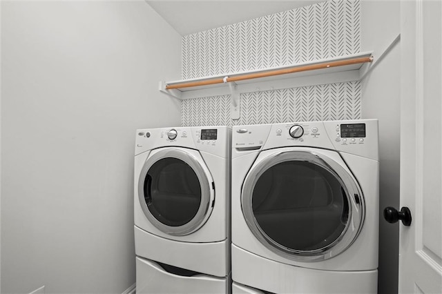 laundry room featuring laundry area and separate washer and dryer