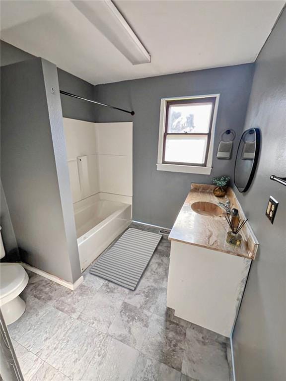 full bathroom featuring toilet, shower / washtub combination, and vanity