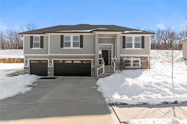 split foyer home featuring a garage