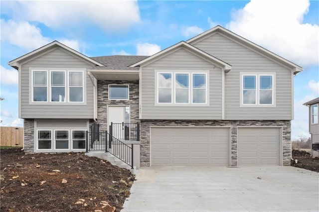 split foyer home featuring a garage