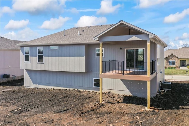 back of property with central AC unit