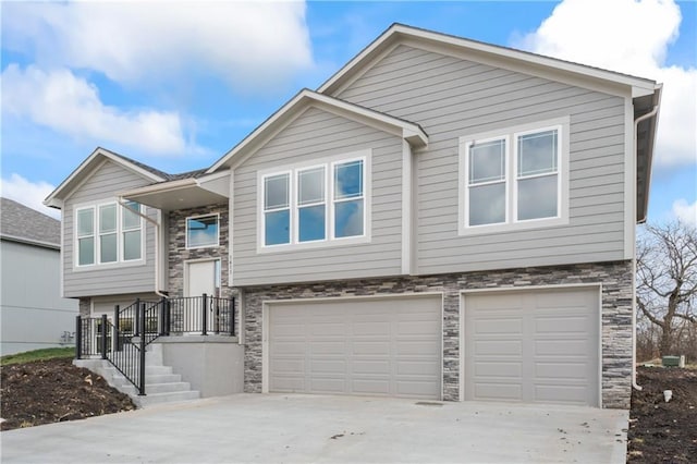 raised ranch featuring a garage