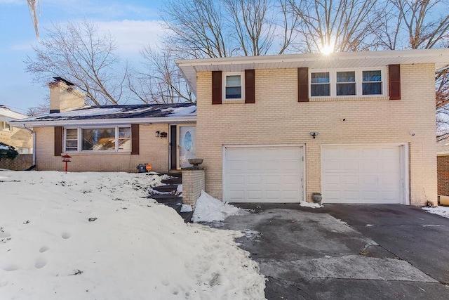 tri-level home featuring a garage