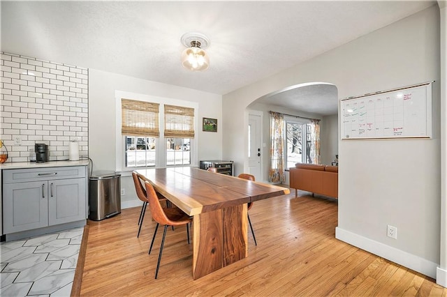 dining space featuring light wood-type flooring