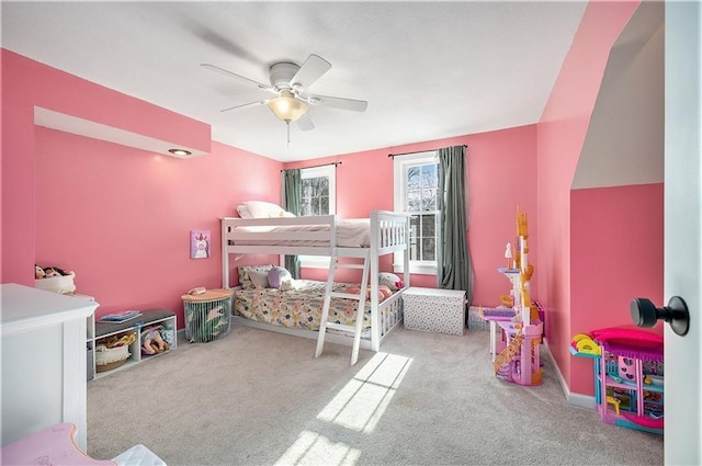 carpeted bedroom with ceiling fan