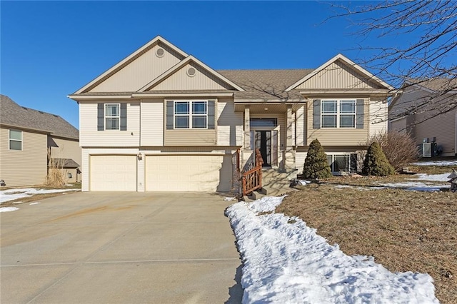 split foyer home featuring a garage