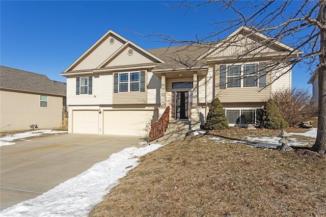 raised ranch featuring a garage