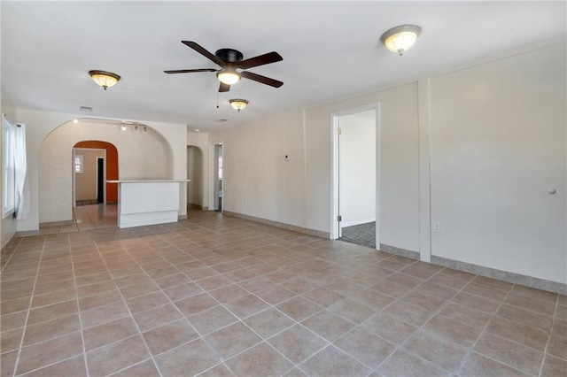 spare room with ceiling fan