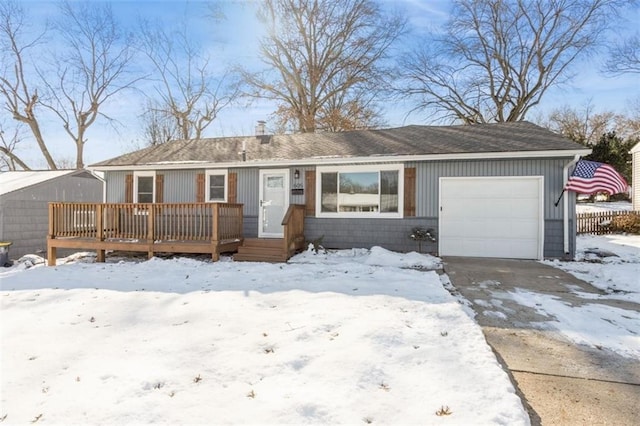 single story home featuring a garage