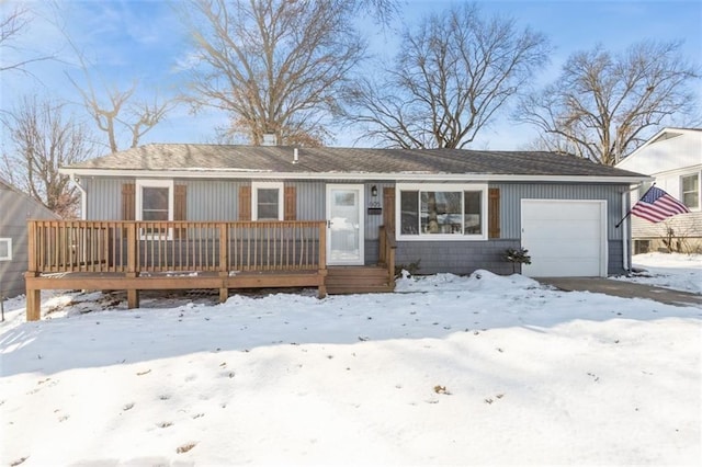 single story home featuring a garage