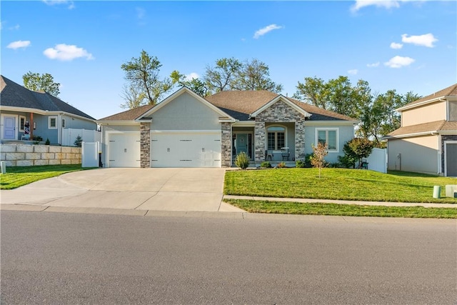 view of front facade featuring a garage and a front yard