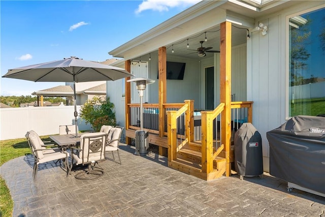 view of patio / terrace with grilling area and ceiling fan