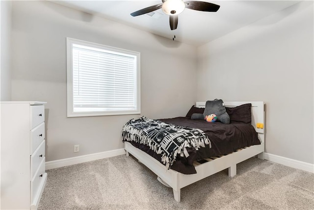 bedroom featuring ceiling fan and carpet floors