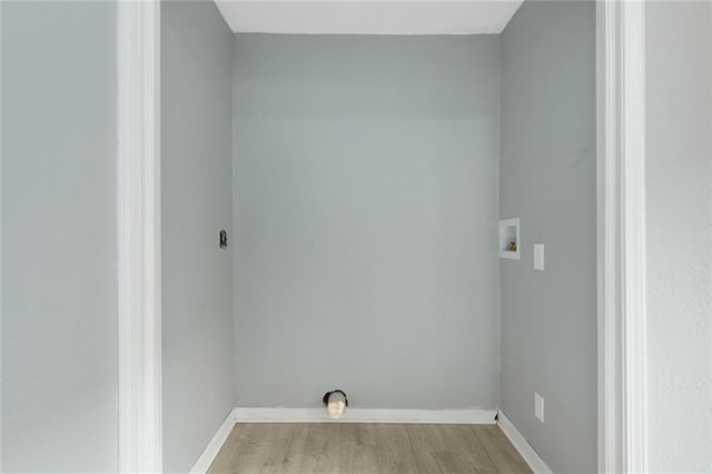 washroom featuring light hardwood / wood-style floors and hookup for a washing machine