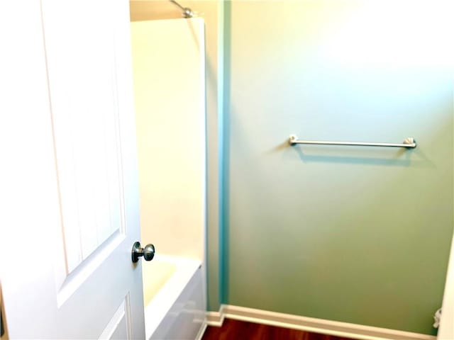 bathroom featuring hardwood / wood-style flooring