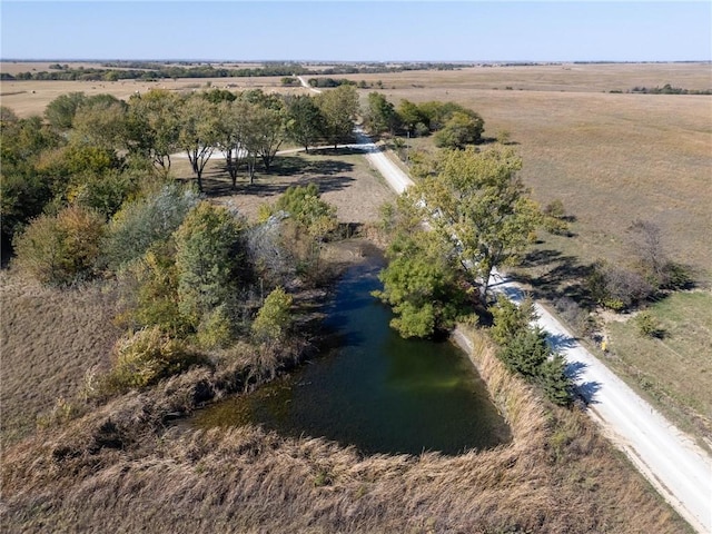 aerial view with a water view and a rural view