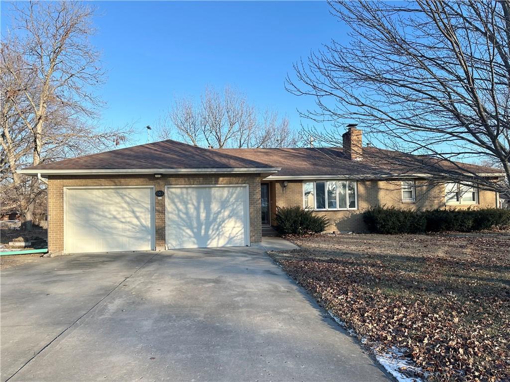 ranch-style home with a garage