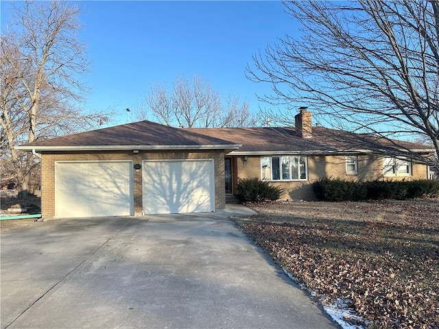 ranch-style home with a garage