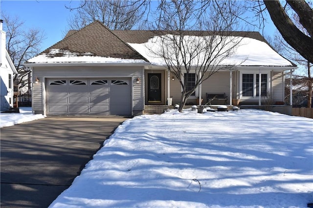 view of front of home with a garage