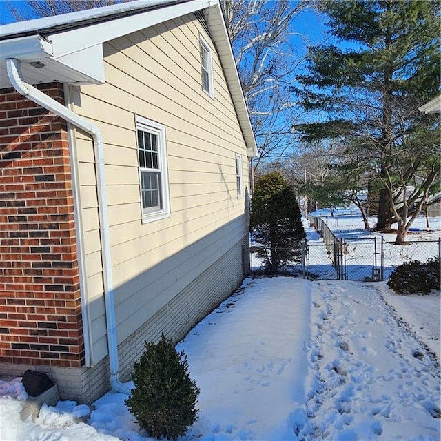 view of snow covered property