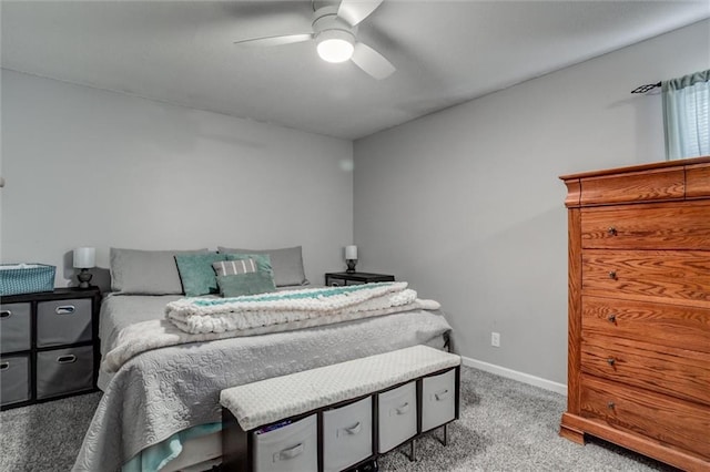 bedroom featuring ceiling fan and light colored carpet