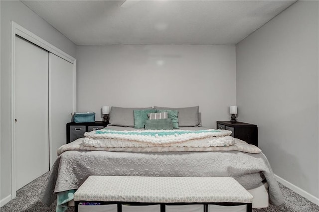 carpeted bedroom with a closet