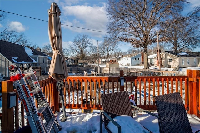 view of snow covered deck