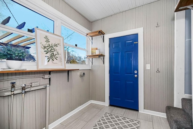 entrance foyer with wooden walls