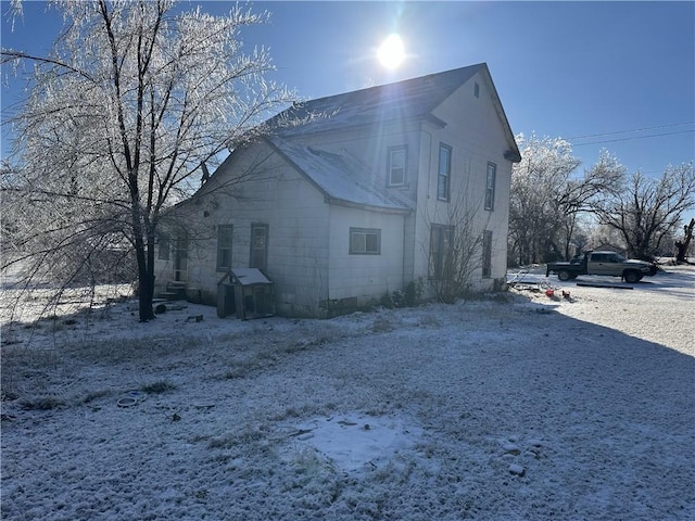 view of snow covered property