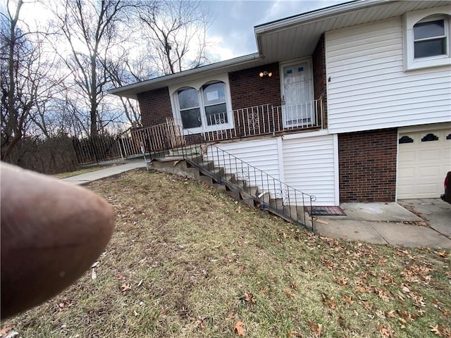 view of side of property with a garage