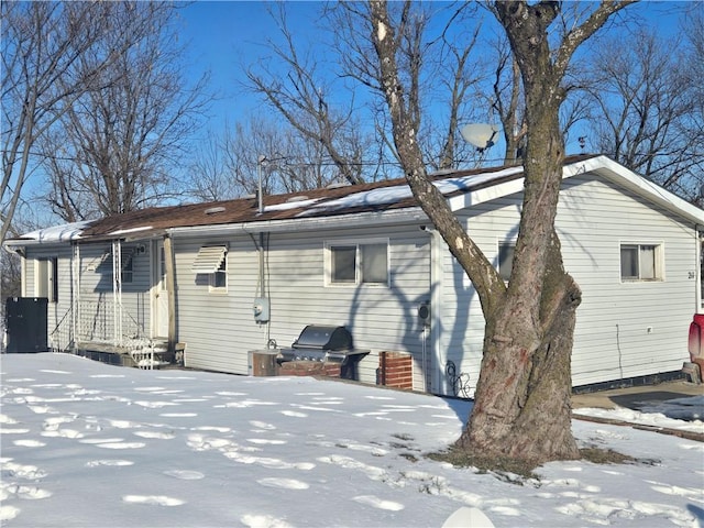 view of snow covered property