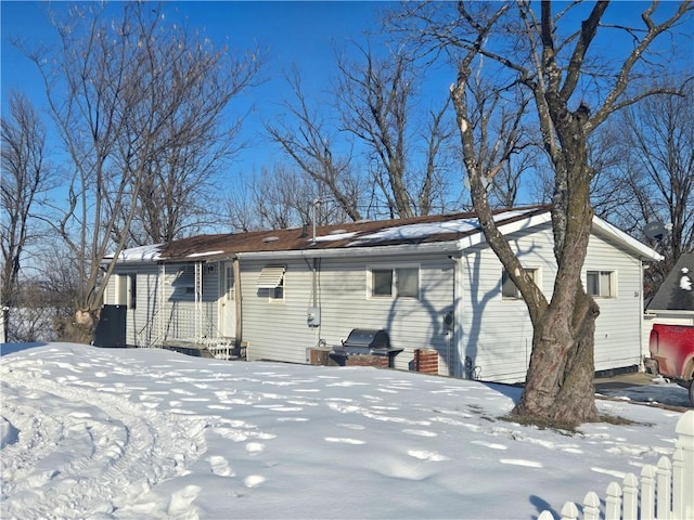 view of snow covered property