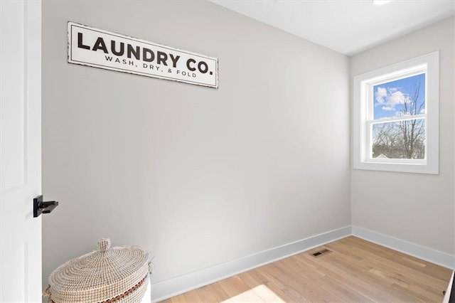 interior space with hardwood / wood-style flooring